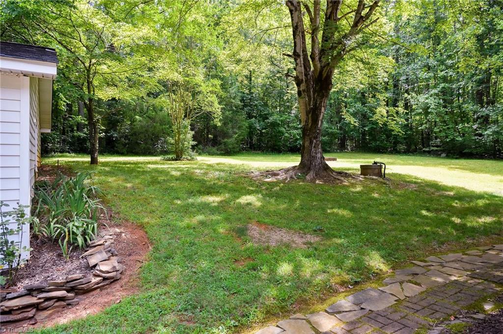 692 Beauchamp Road Advance, NC 27006 - Photo 32 of 40 Amazing, private back yard with a fire pit!
