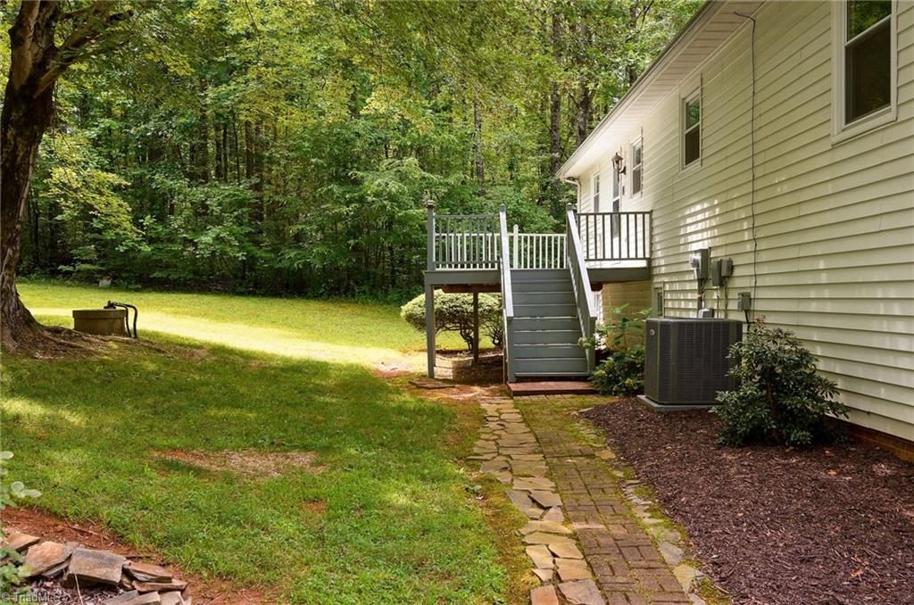 692 Beauchamp Road Advance, NC 27006 - Photo 34 of 40 Back deck leads into the kitchen. Peep the BRAND-NEW HVAC system!