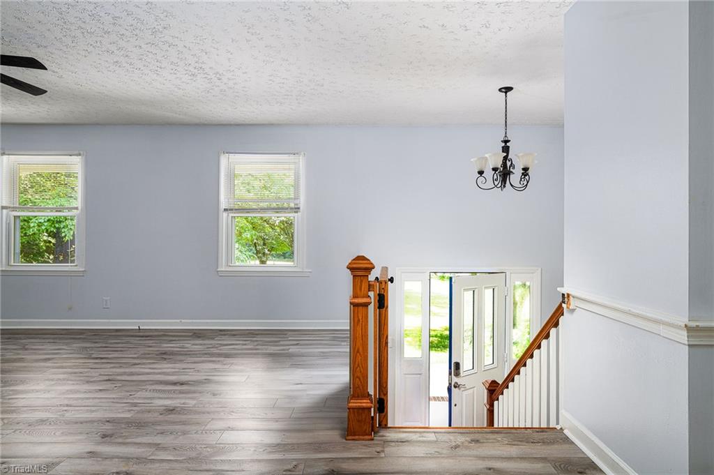 692 Beauchamp Road Advance, NC 27006 - Photo 5 of 40 Natural light floods the entryway!