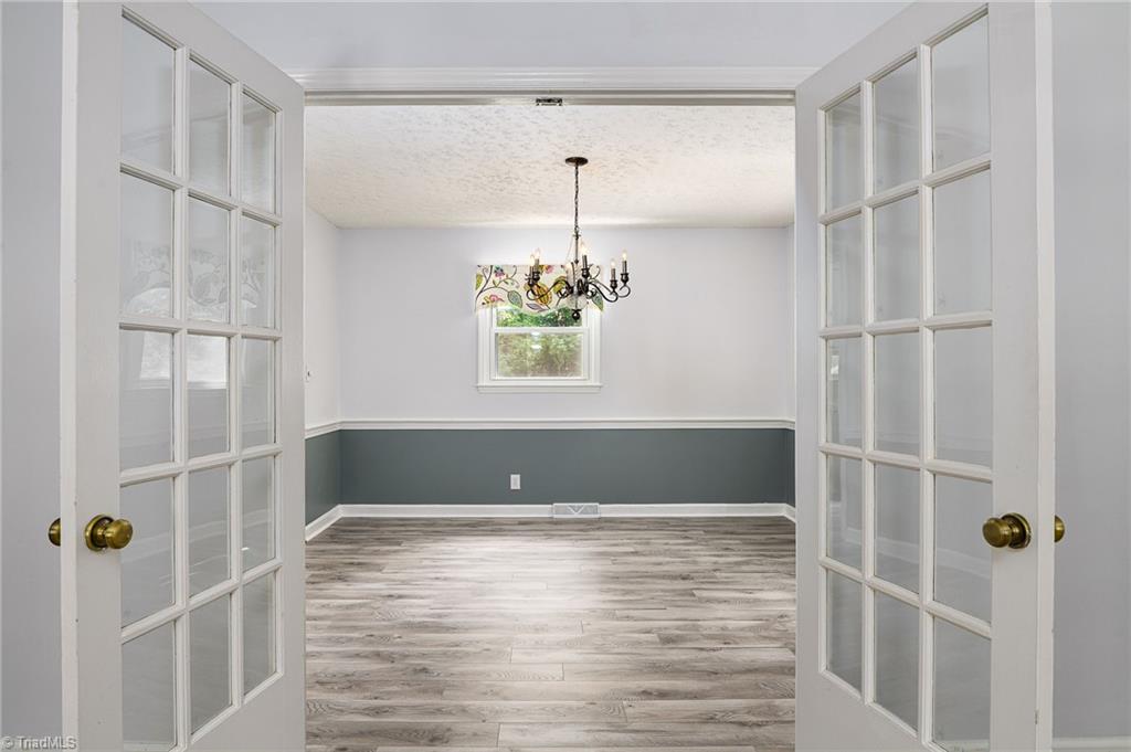 692 Beauchamp Road Advance, NC 27006 - Photo 9 of 40 French doors lead to the dining room