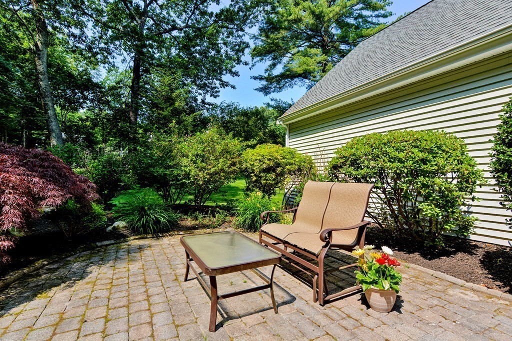 51 Pennock Road Ashland, MA 01721 - Photo 33 of 40 a backyard of a house with table and chairs