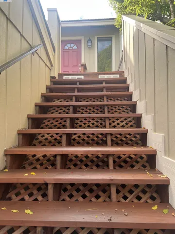 a backyard of a house with lots of trees