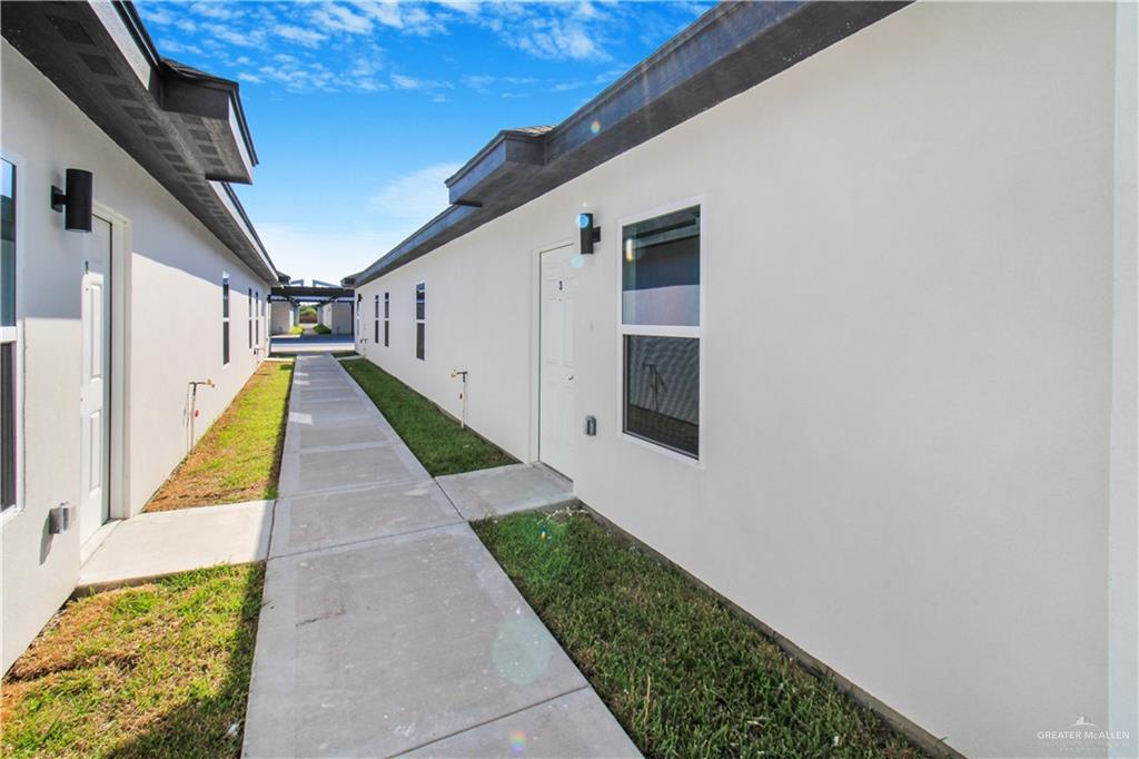 a view of a house with wooden stairs
