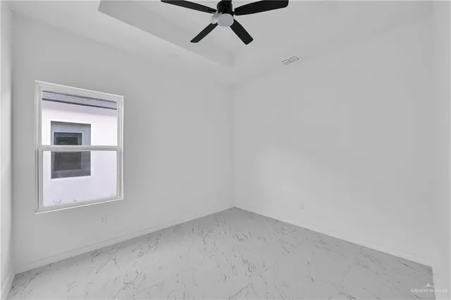 a view of a room with rack and window