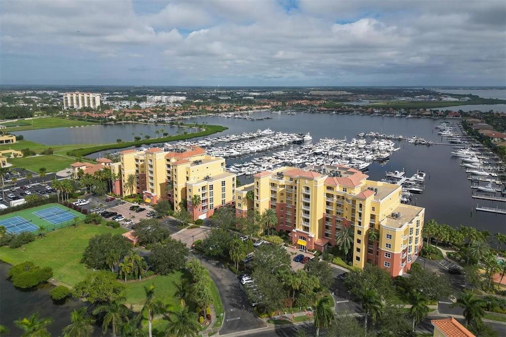 615 Riviera Dunes Way, Unit 406 Palmetto, FL 34221 - Photo 28 of 28 a view of a lake with a city