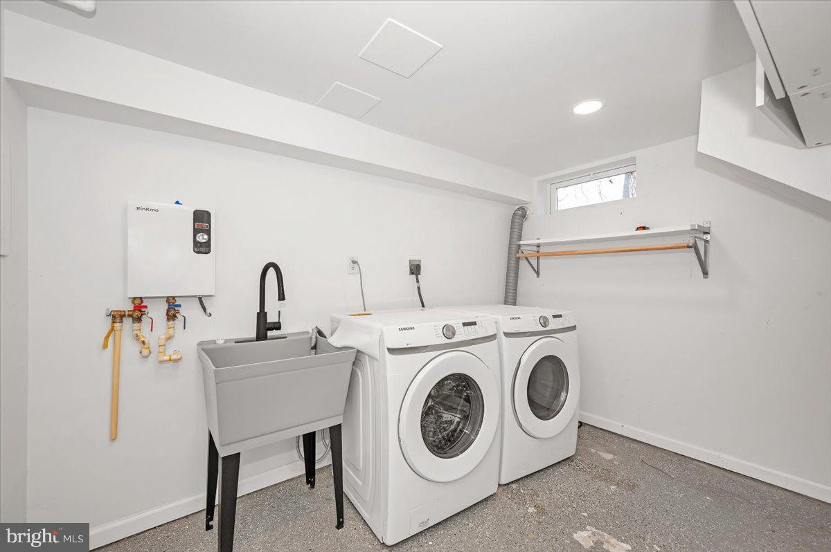 4511 Bennion Road Silver Spring, MD 20906 - Photo 24 of 40 a utility room with dryer and washer