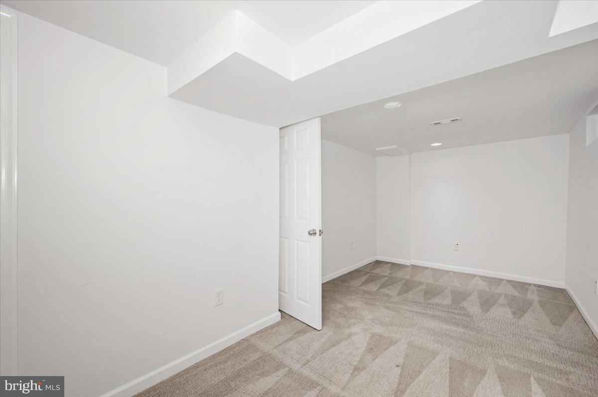 4511 Bennion Road Silver Spring, MD 20906 - Photo 27 of 40 an empty room with an entryway