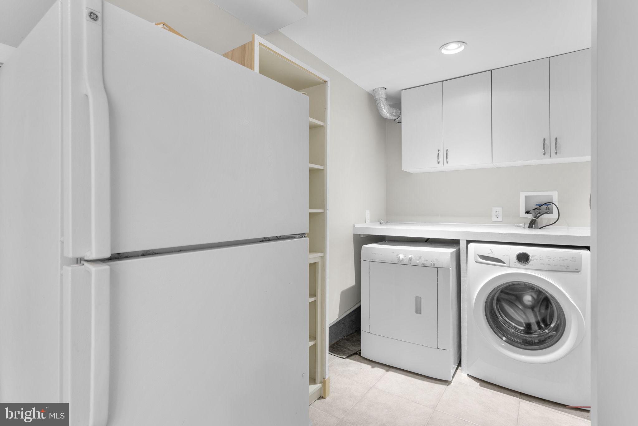 37 Shelldrake Court Damascus, MD 20872 - Photo 27 of 30 Lower level laundry and extra fridge