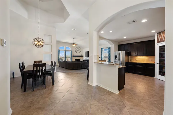 a view of a kitchen and dining room
