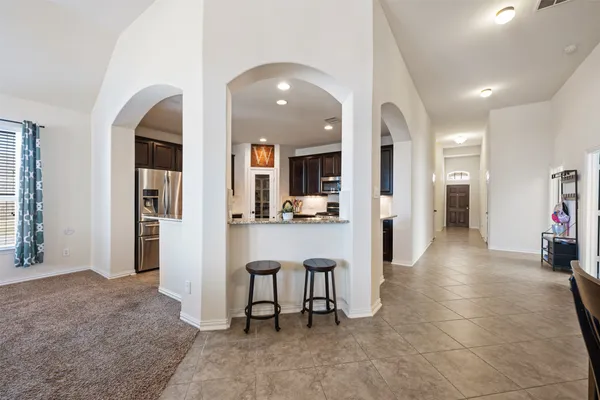 a view of hall with dining area and livingroom view