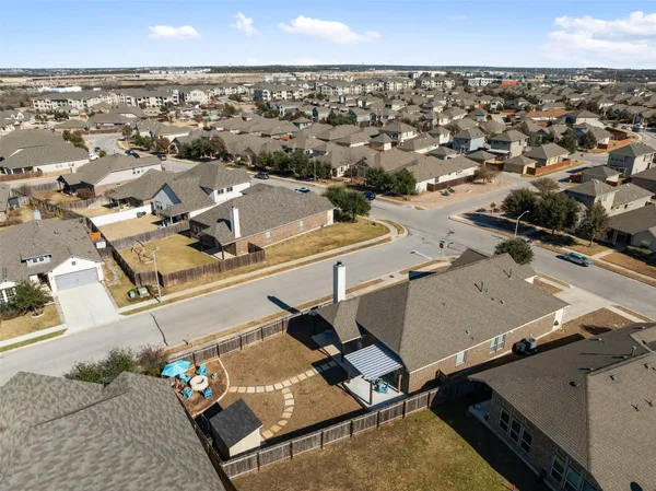 a front view of a house with parking space