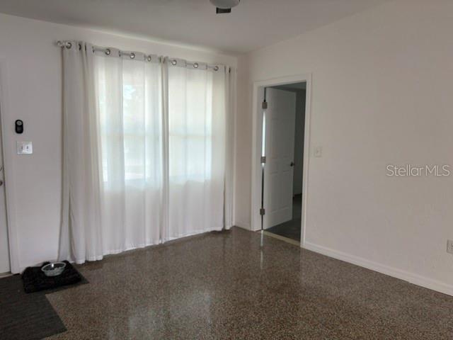 11601 109th Street Seminole, FL 33778 - Photo 3 of 29 a view of empty room with windows