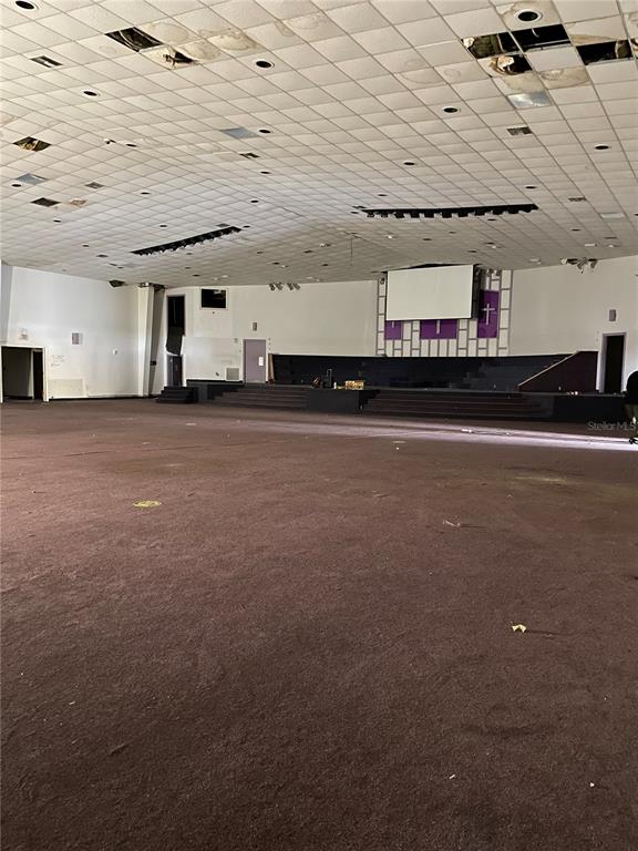 2425 North Hiawassee Road Orlando, FL 32818 - Photo 4 of 10 a view of a room next to a building