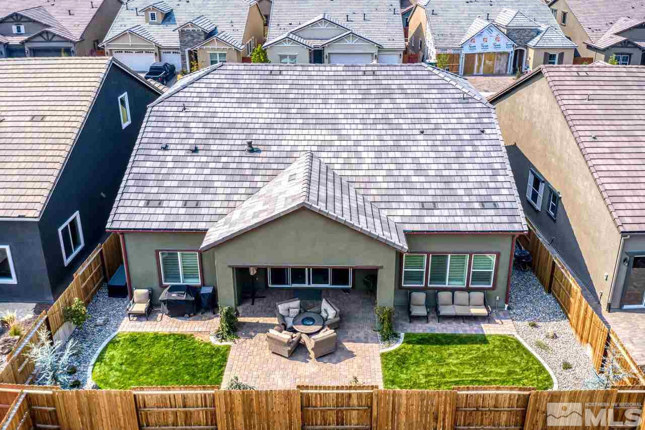 9450 Baldacci Road Reno, NV 89521 - Photo 39 of 40 a front view of house with yard outdoor seating and barbeque oven