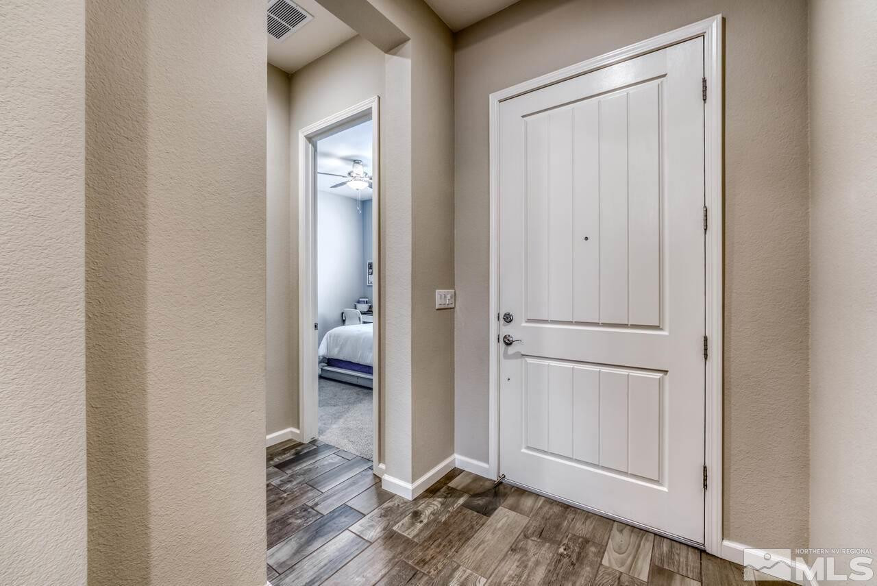 9450 Baldacci Road Reno, NV 89521 - Photo 4 of 40 a view of bedroom with wooden floor