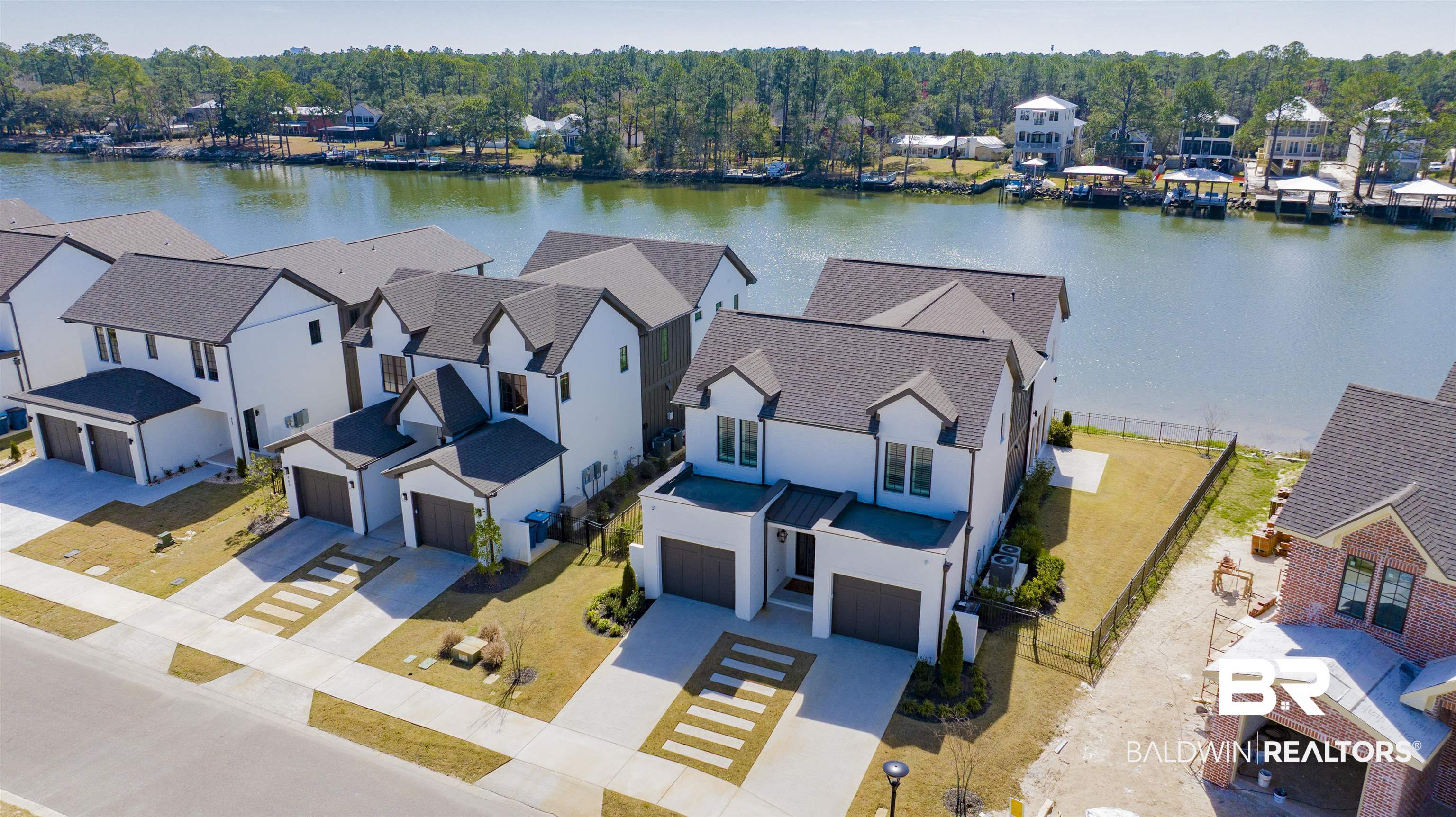 861 Inlet Circle Gulf Shores, AL 36542 - Photo 51 of 54 Aerial perspective of suburban area with a nearby body of water
