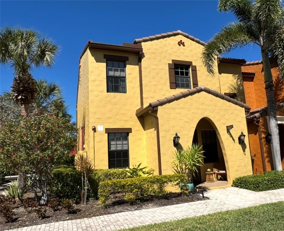 Mediterranean / spanish-style home with stucco siding