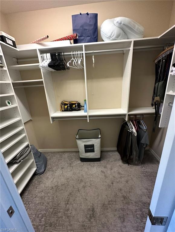 8997 Cambria Circle, Unit 2001 Naples, FL 34113 - Photo 18 of 42 Spacious closet featuring carpet