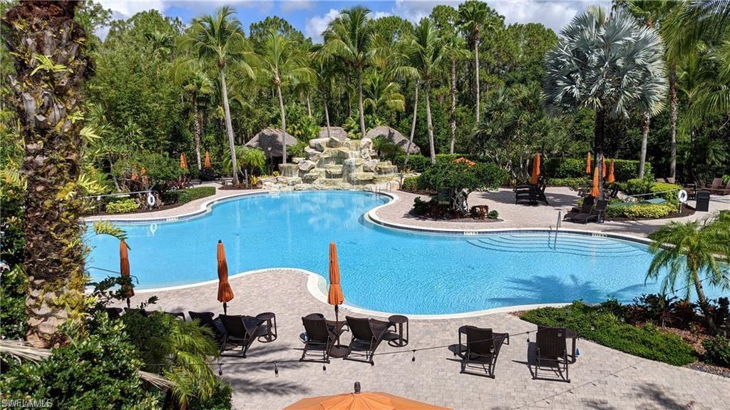 8997 Cambria Circle, Unit 2001 Naples, FL 34113 - Photo 32 of 42 Pool featuring a patio area
