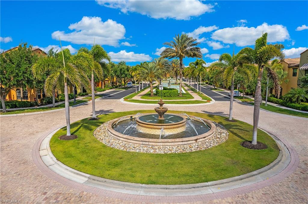 8997 Cambria Circle, Unit 2001 Naples, FL 34113 - Photo 36 of 42 Surrounding community with a yard