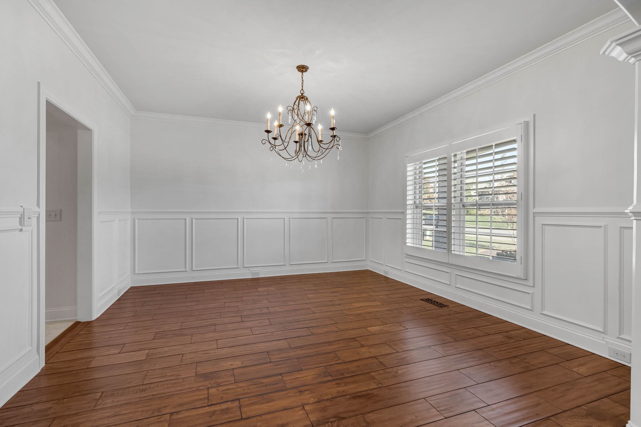 2065 Autumn Ridge Way Spring Hill, TN 37174 - Photo 11 of 58 a view of an empty room with wooden floor and a window