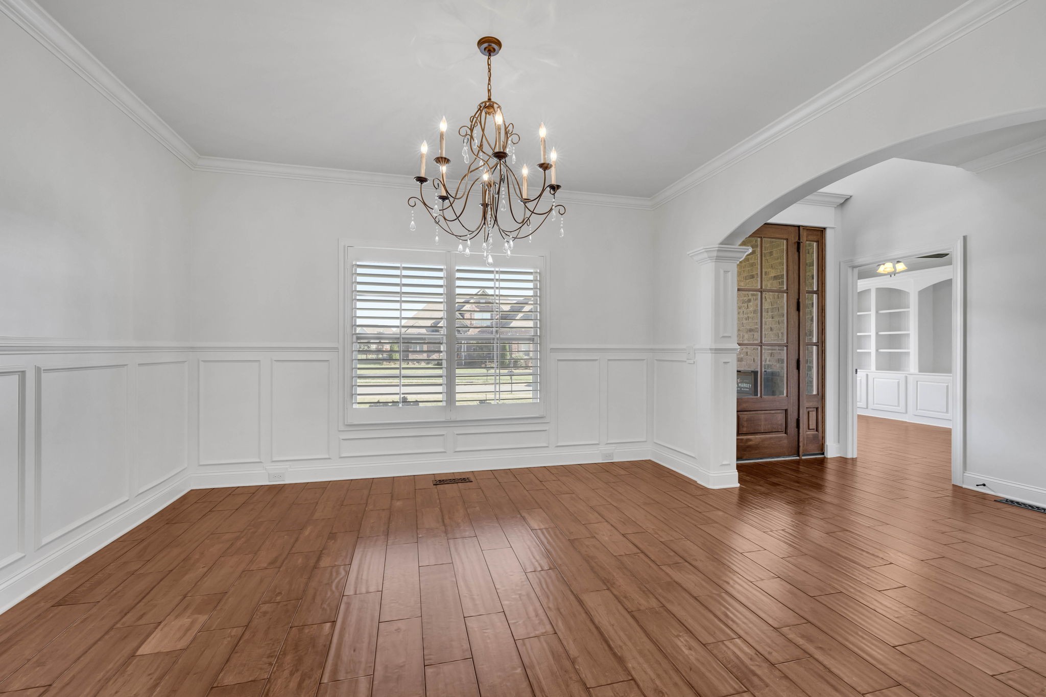 2065 Autumn Ridge Way Spring Hill, TN 37174 - Photo 12 of 58 a view of an empty room with wooden floor and a window