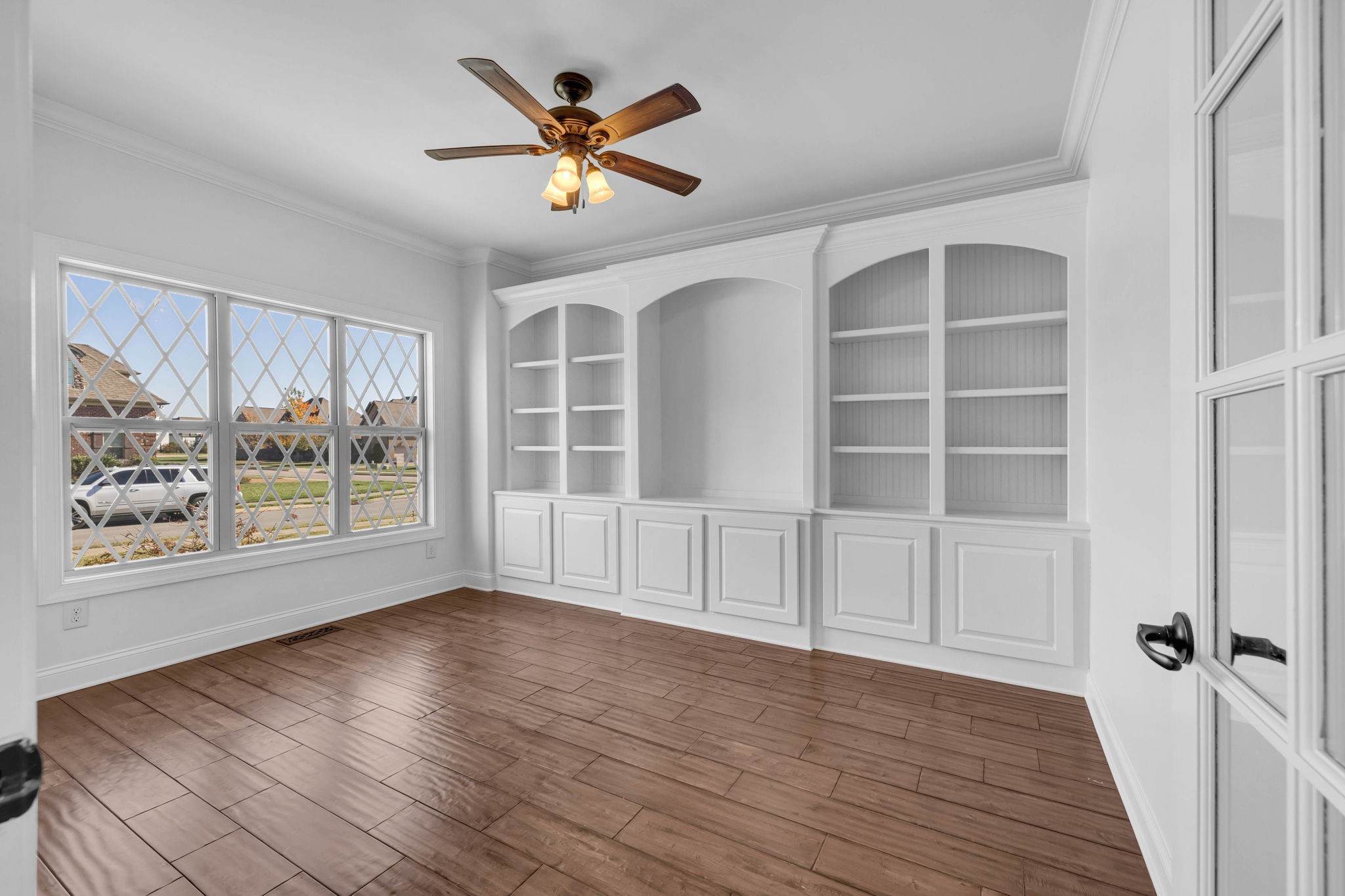 2065 Autumn Ridge Way Spring Hill, TN 37174 - Photo 14 of 58 a view of an empty room with a window and wooden floor