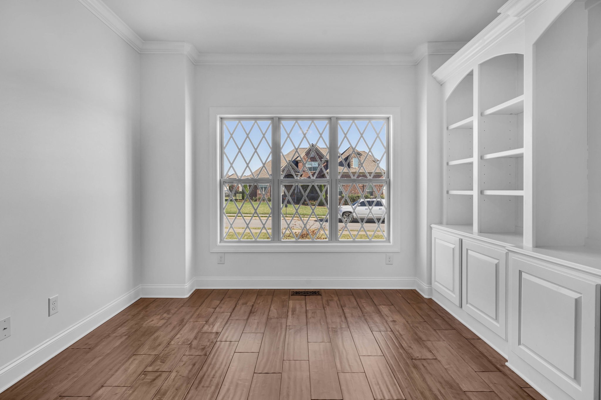 2065 Autumn Ridge Way Spring Hill, TN 37174 - Photo 15 of 58 an empty room with wooden floor and windows
