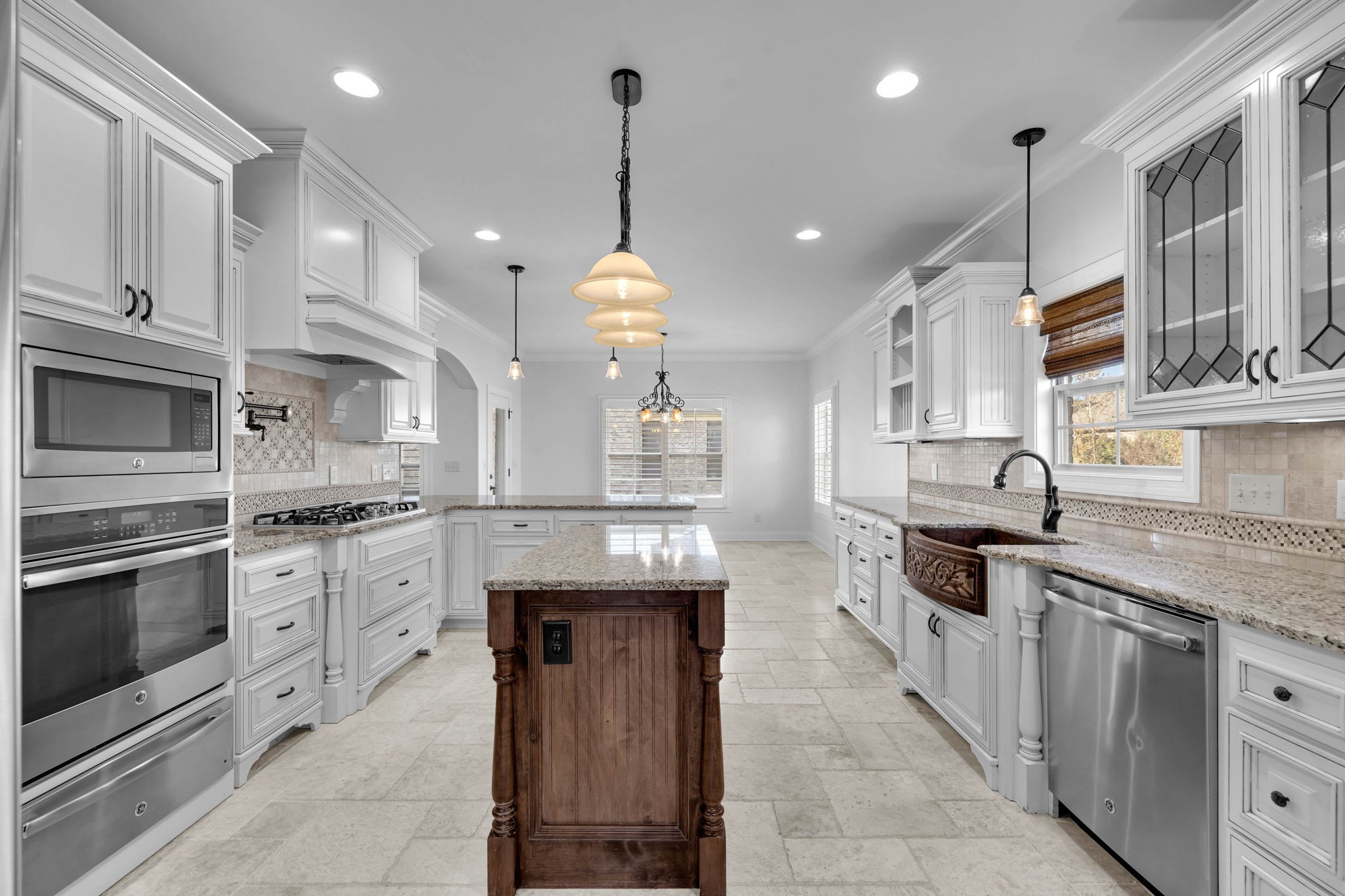 2065 Autumn Ridge Way Spring Hill, TN 37174 - Photo 18 of 58 a kitchen with stainless steel appliances granite countertop wooden cabinets sink and stove