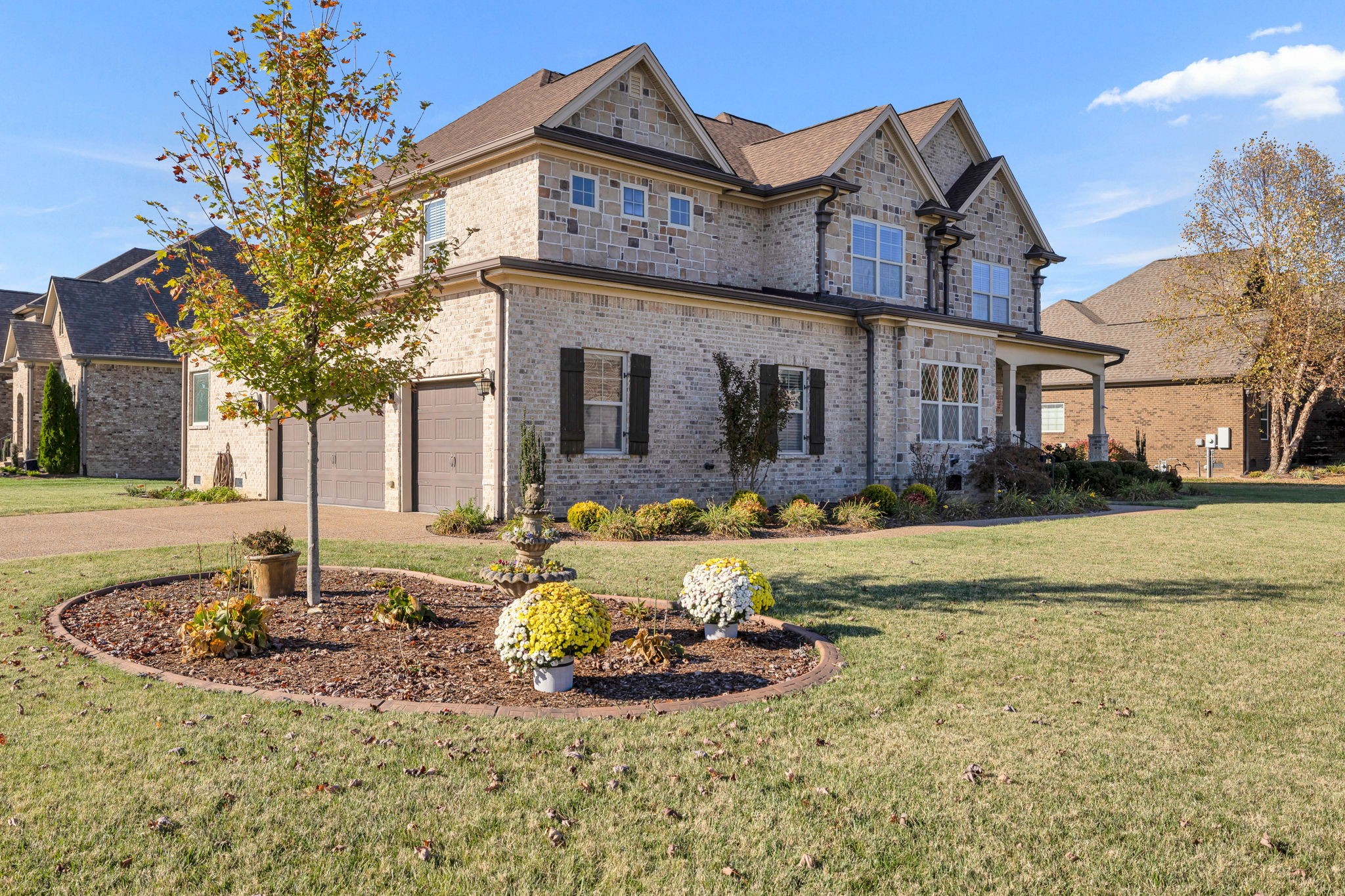 2065 Autumn Ridge Way Spring Hill, TN 37174 - Photo 3 of 58 a front view of a house with swimming pool yard and outdoor seating