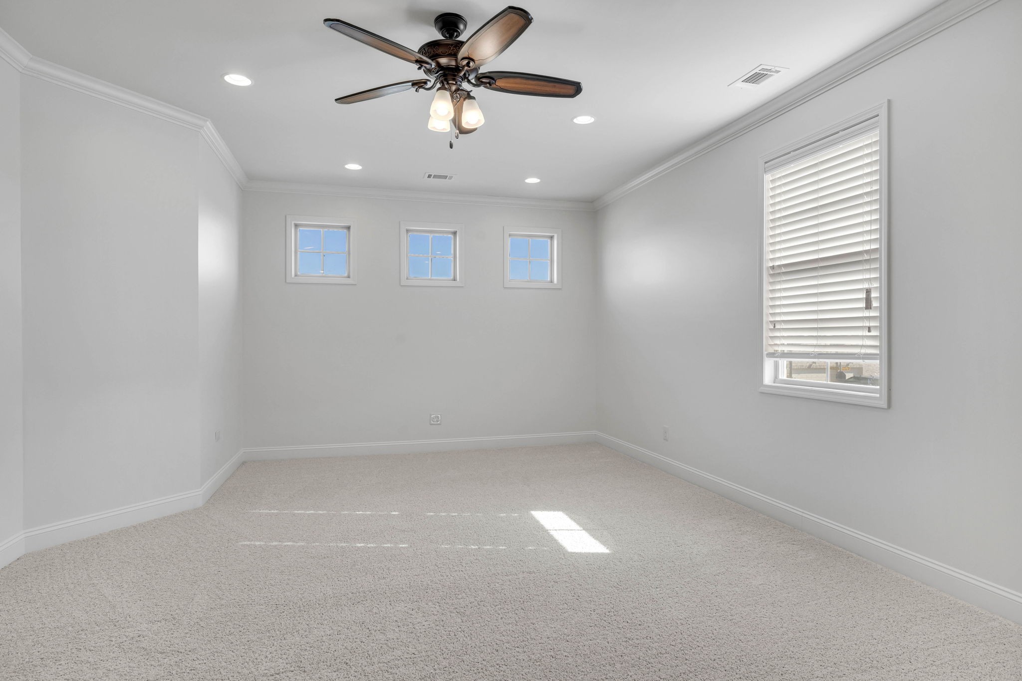 2065 Autumn Ridge Way Spring Hill, TN 37174 - Photo 44 of 58 an empty room with a window and a fan