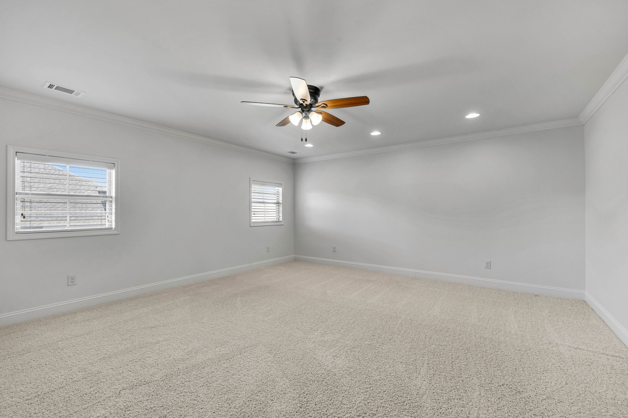 2065 Autumn Ridge Way Spring Hill, TN 37174 - Photo 46 of 58 an empty room with windows and chandelier fan