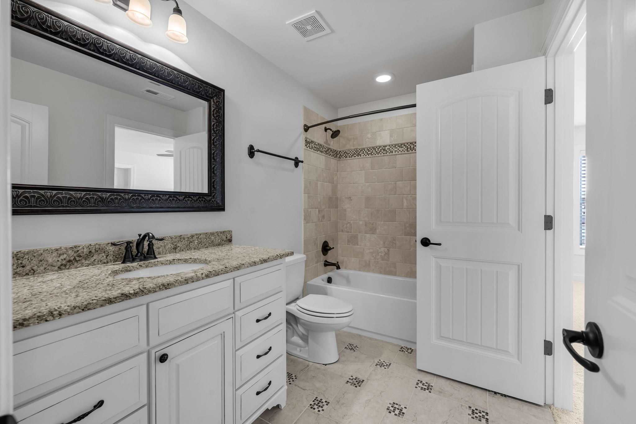 2065 Autumn Ridge Way Spring Hill, TN 37174 - Photo 49 of 58 a bathroom with a granite countertop sink toilet and shower