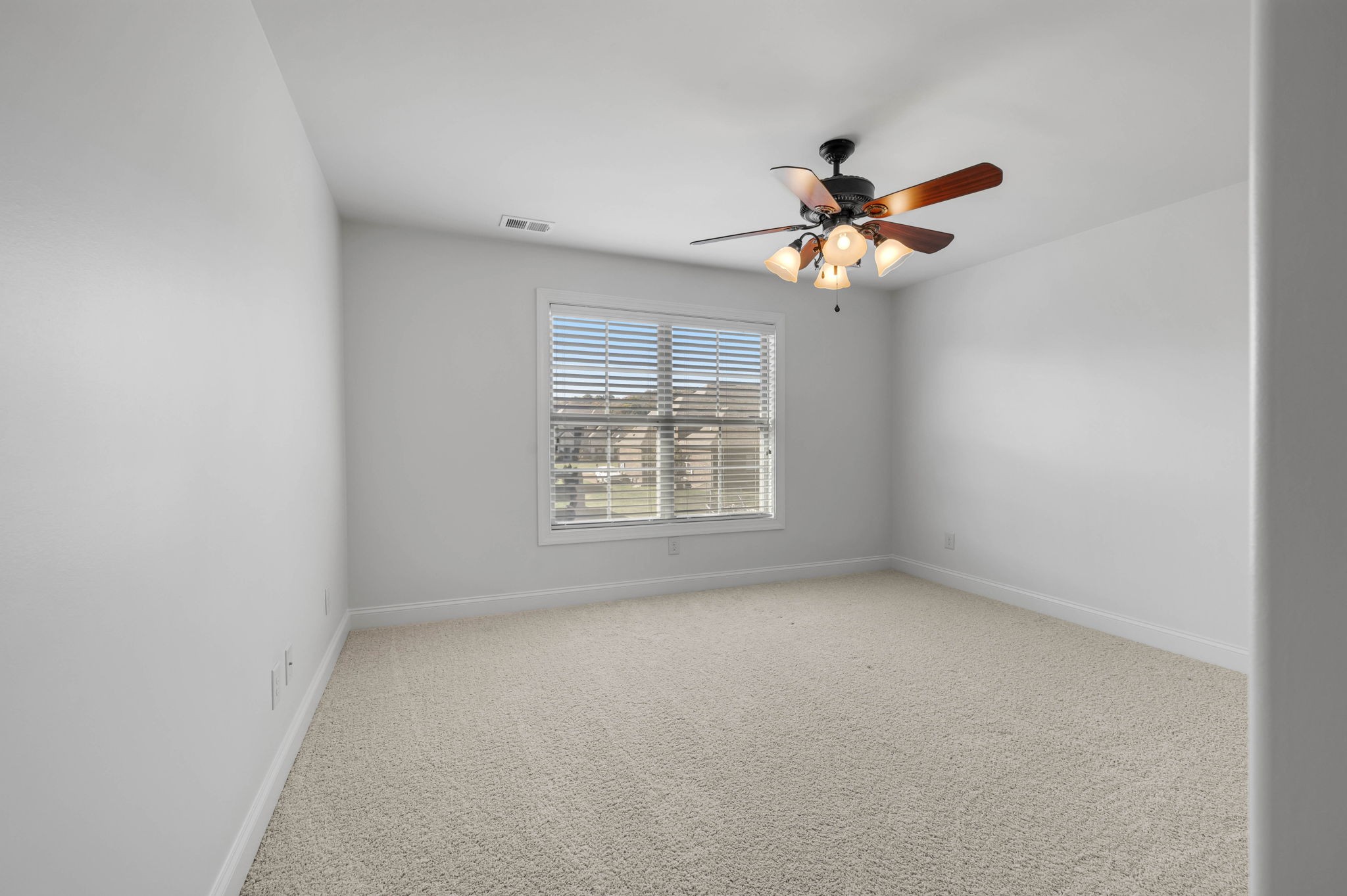 2065 Autumn Ridge Way Spring Hill, TN 37174 - Photo 52 of 58 a view of room with a ceiling fan and window