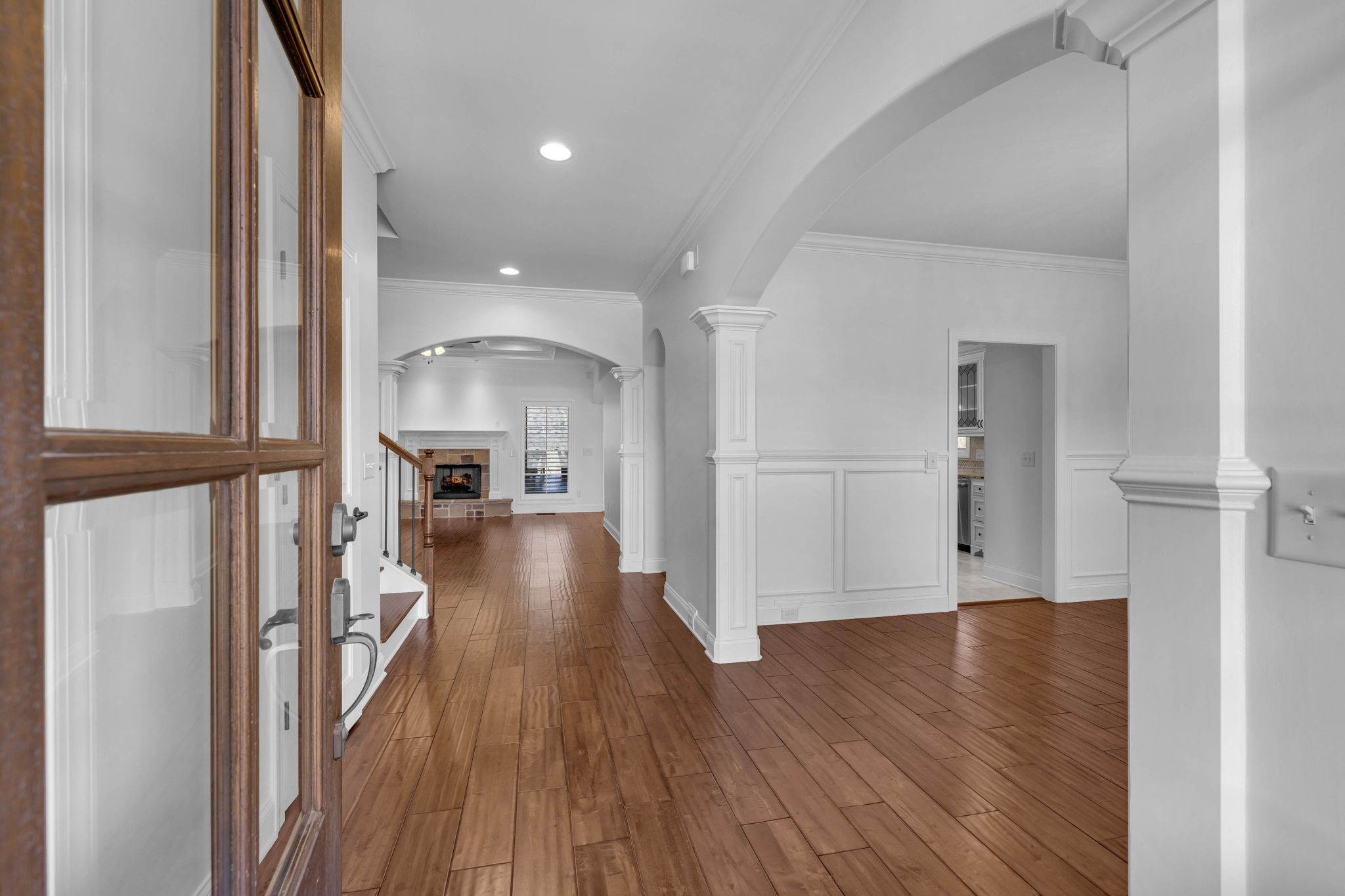 2065 Autumn Ridge Way Spring Hill, TN 37174 - Photo 9 of 58 a view of a hallway view with wooden floor and a living room