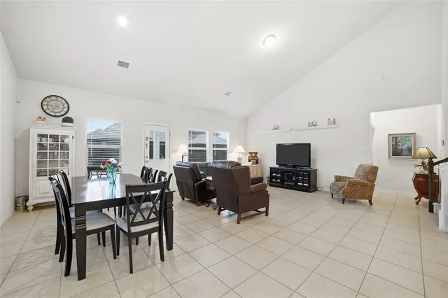a view of a livingroom with furniture and a flat screen tv