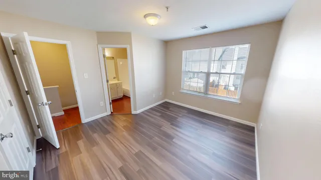 a bathroom with a sink a mirror and a shower