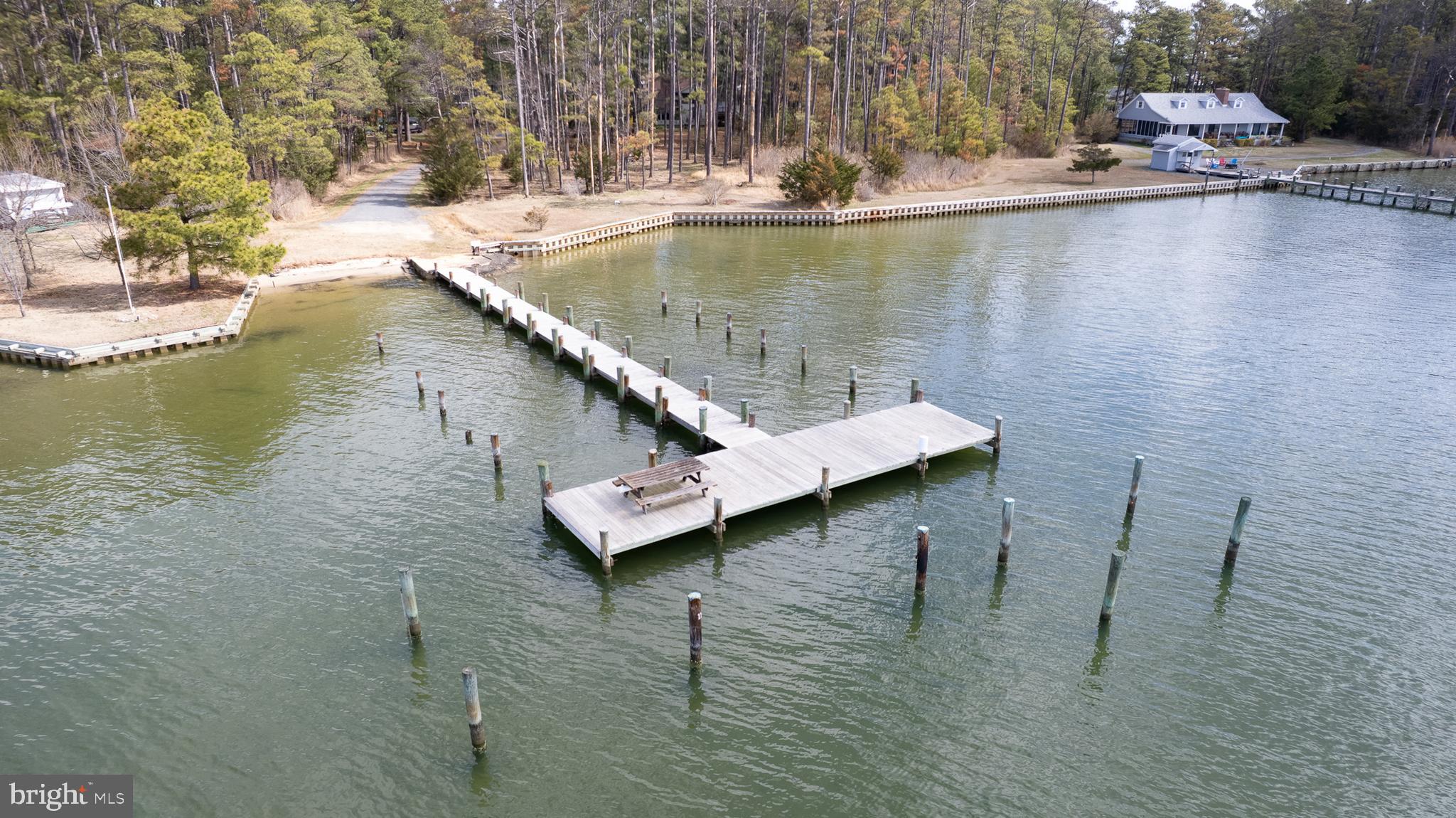 819 Seabreeze Road Cambridge, MD 21613 - Photo 3 of 31 a view of a lake with outdoor seating