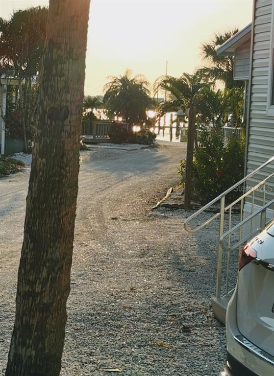 12507 Cortez Road West, Unit 19 Cortez, FL 34215 - Photo 3 of 31 a view of a backyard