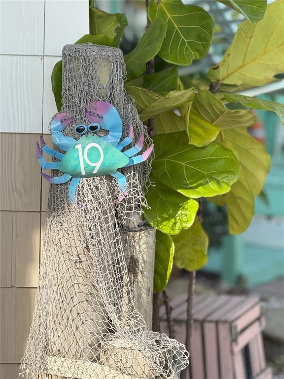 12507 Cortez Road West, Unit 19 Cortez, FL 34215 - Photo 31 of 31 a vase of flowers sitting on a table