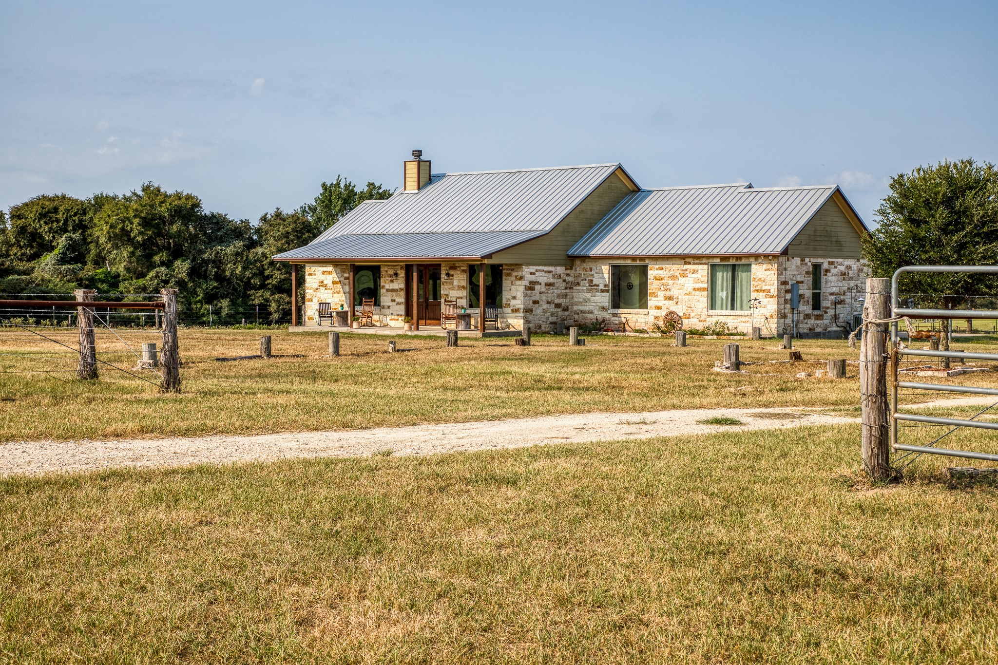 8201 Lone Star Road Washington, TX 77880 - Photo 1 of 22 a front view of a house with a yard