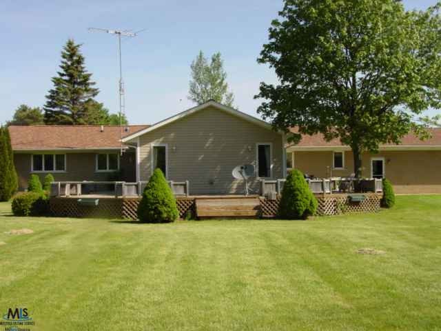 10579 Yale Road Yale, MI 48097 - Photo 19 of 23 This is a view of the back of the home and the wrap around deck.