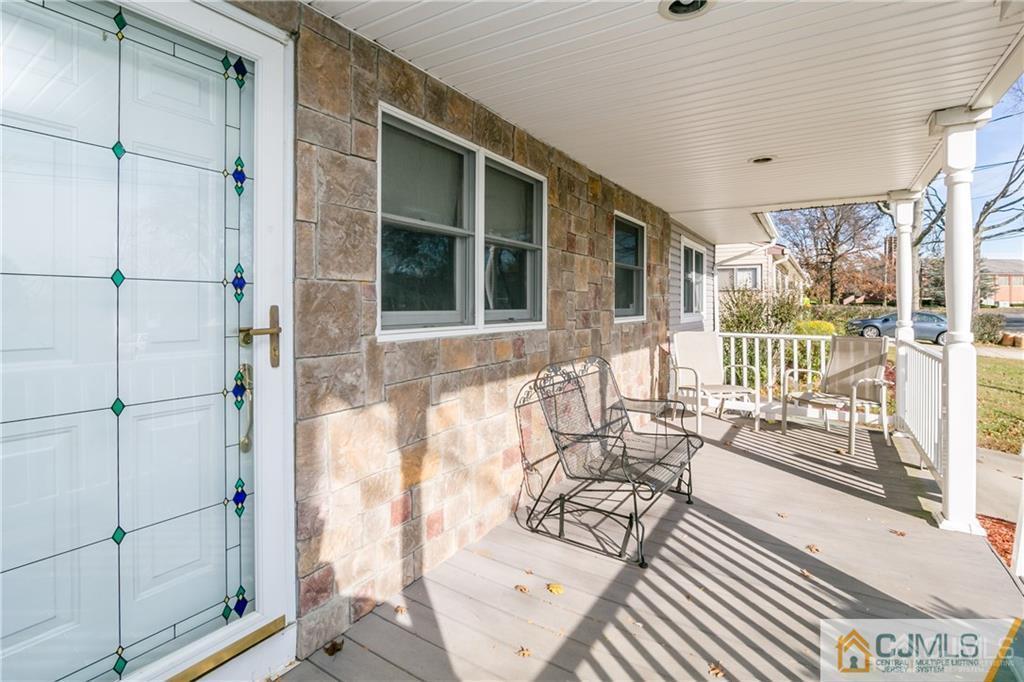 7 Columbia Road Old Bridge, NJ 08859 - Photo 5 of 25 a view of a living room and a balcony