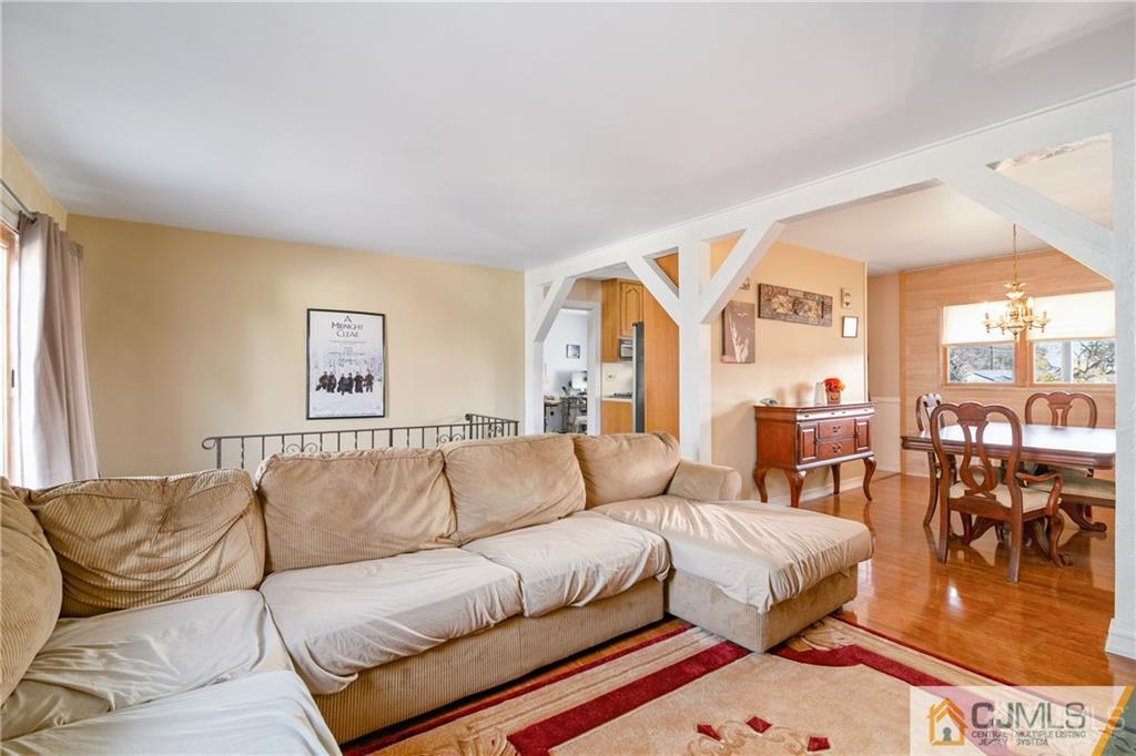 7 Columbia Road Old Bridge, NJ 08859 - Photo 6 of 25 a living room with furniture and a large window
