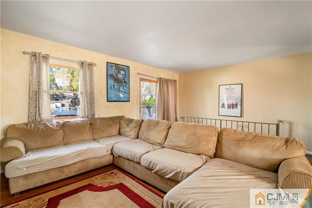 7 Columbia Road Old Bridge, NJ 08859 - Photo 7 of 25 a living room with furniture and a couch