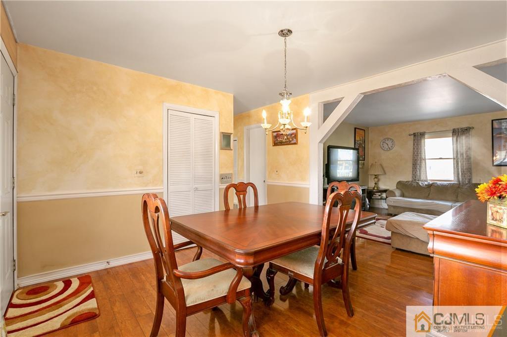 7 Columbia Road Old Bridge, NJ 08859 - Photo 10 of 25 a view of a dining room with furniture window and wooden floor
