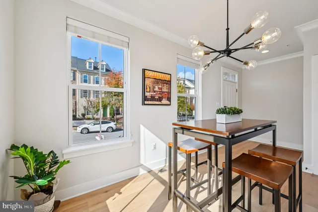 a kitchen with stainless steel appliances a stove and cabinets