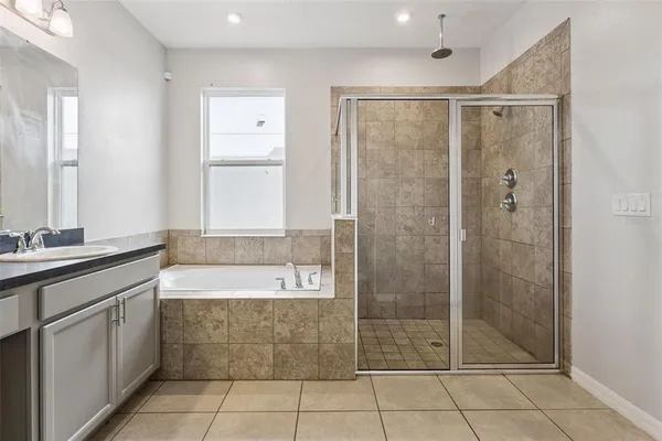 a bathroom with a sink a toilet and a bathtub