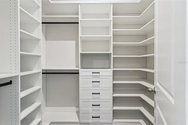 a utility room with sink dryer and washer