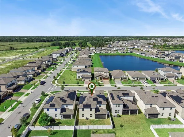 a aerial view of a house with a garden